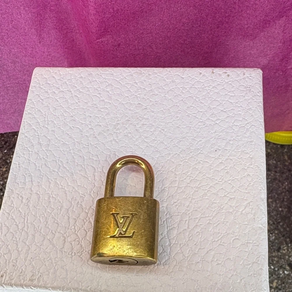 Louis Vuitton Gold Padlock no key